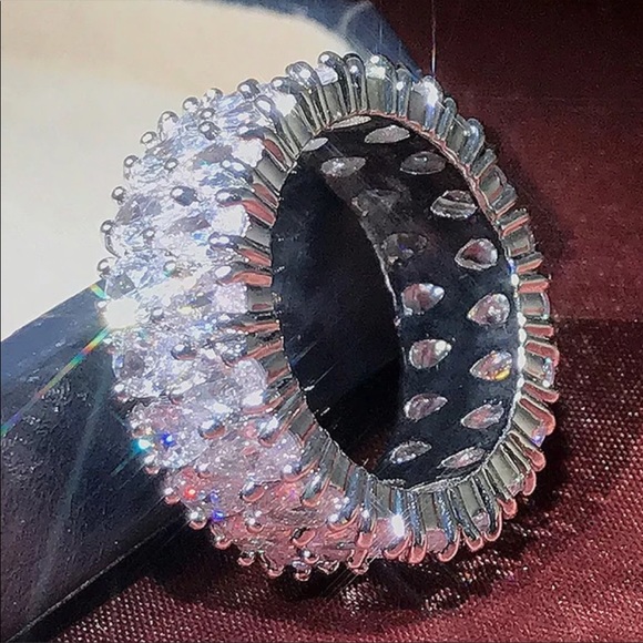 ETERNITY DIAMOND 925 STERLING SILVER RING. I did not wear it, it’s tight for me. - Picture 4 of 8